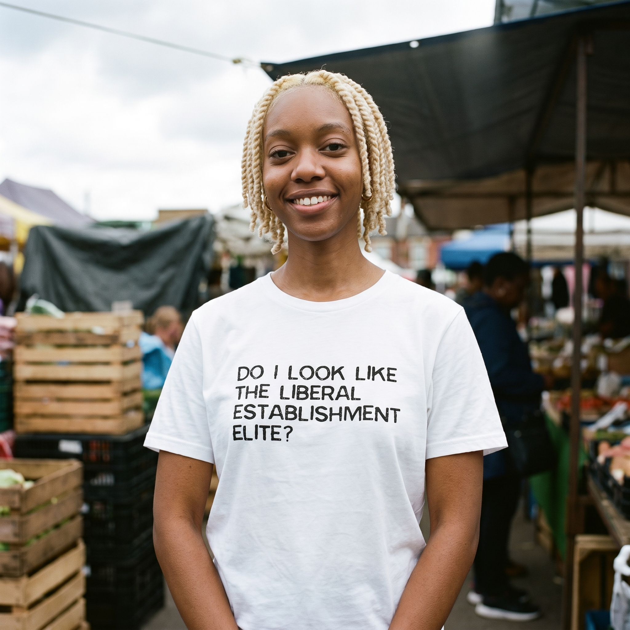 Woman in a white Do I Look Like the Liberal Establishment Elite t-shirt at a market stall, Very Brexit Problems