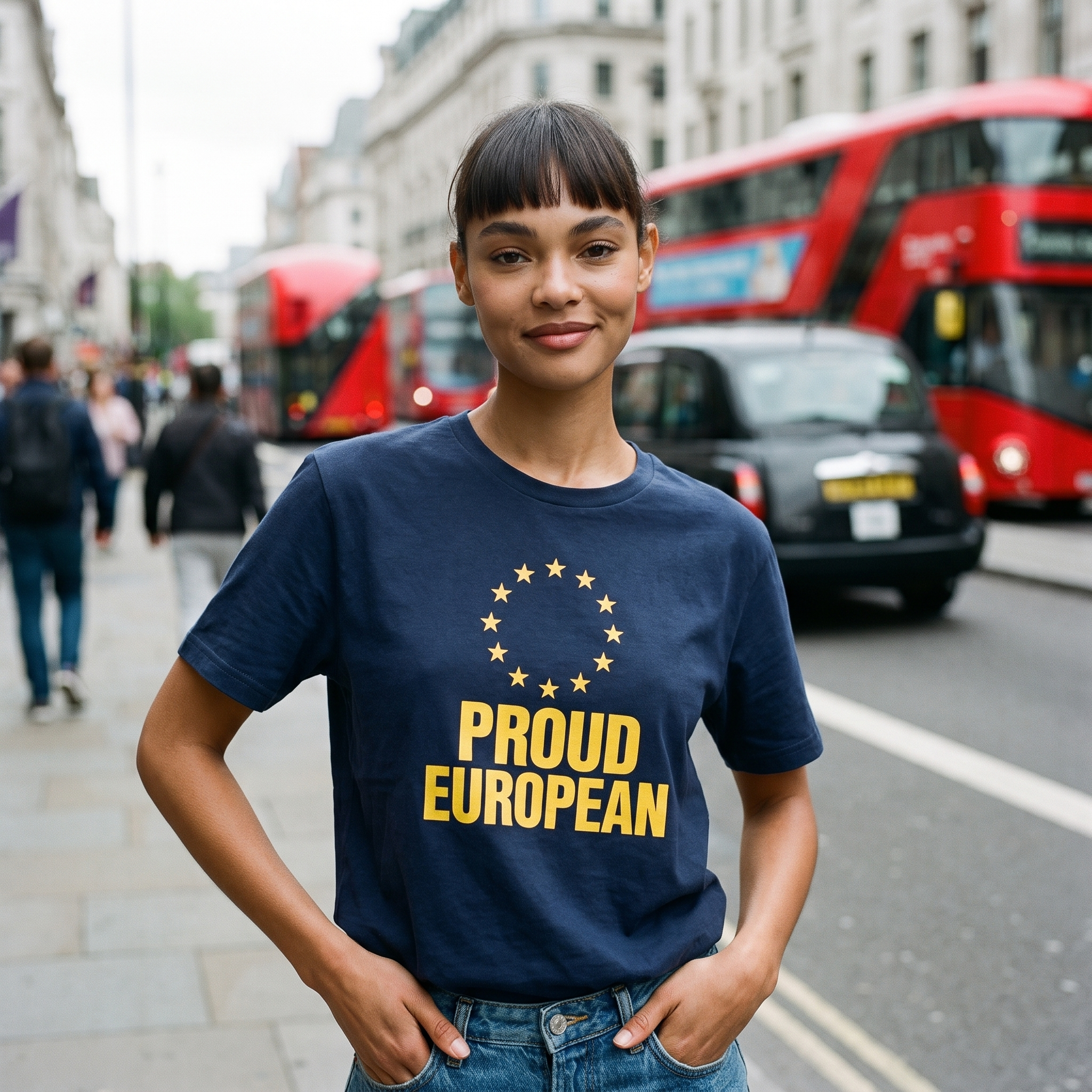 Woman in a navy Proud European t-shirt on a London street with buses behind, Very Brexit Problems
