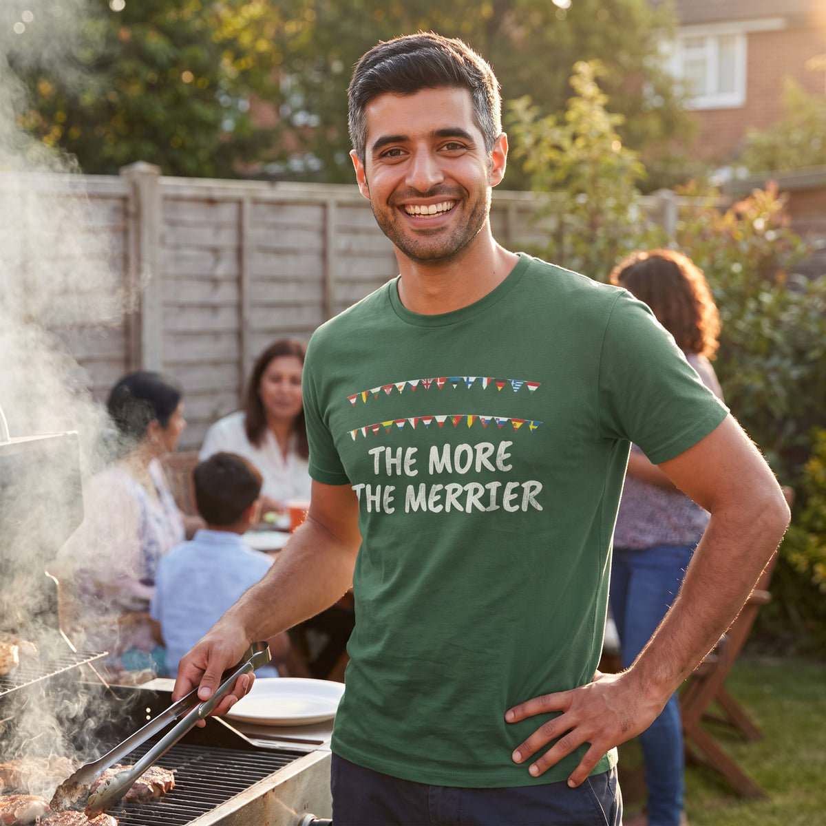 Man at a family barbecue wearing the forest green The More the Merrier pro-European t-shirt