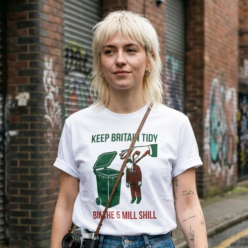 Young woman with bleached blonde shag haircut wearing the white Bin the 5 Mill Shill t-shirt on a London street, print close and legible, Very Brexit Problems