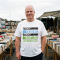 Man in a white Fascism is Cured by Reading t-shirt at a second-hand bookstall, Very Brexit Problems