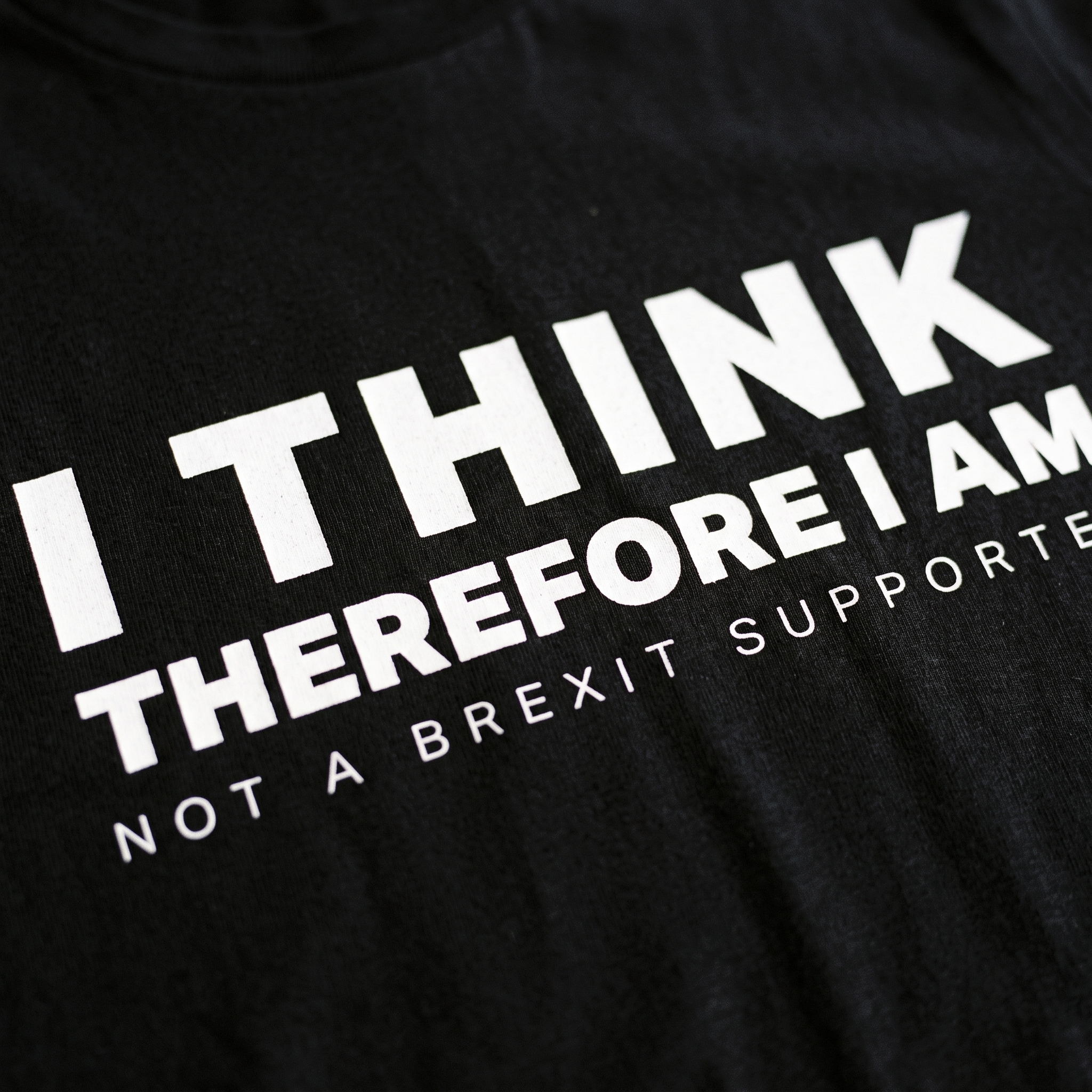 Not a Brexit Supporter print filling the frame on black cotton fabric, Very Brexit Problems